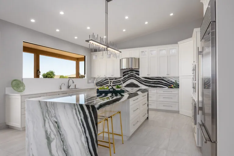 Tucson kitchen with quartz countertops and waterfall edge