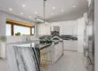 Tucson kitchen with quartz countertops and waterfall edge
